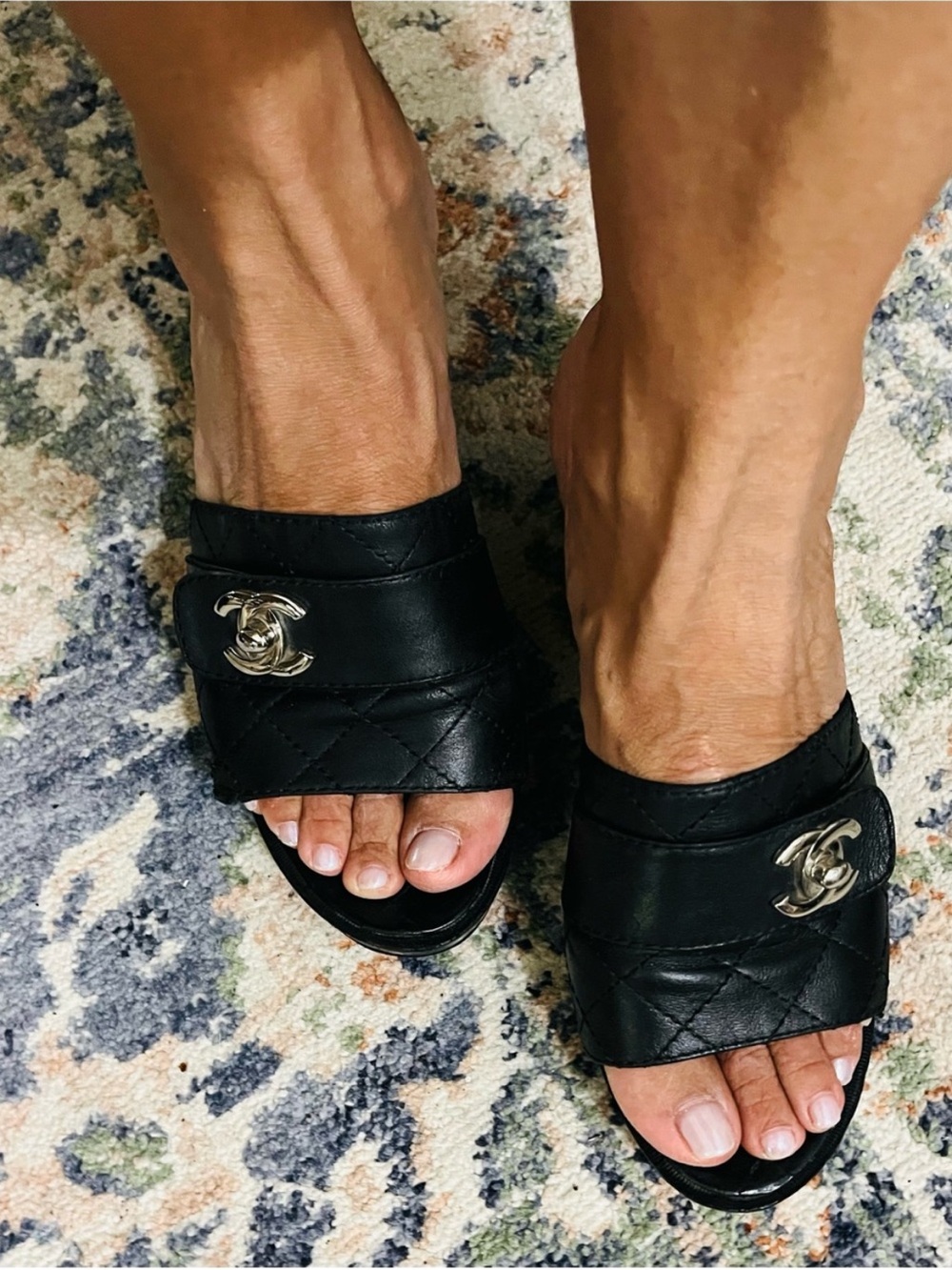 CHANEL Black Quilted Leather Slide Mules with Silver CC Hardware
